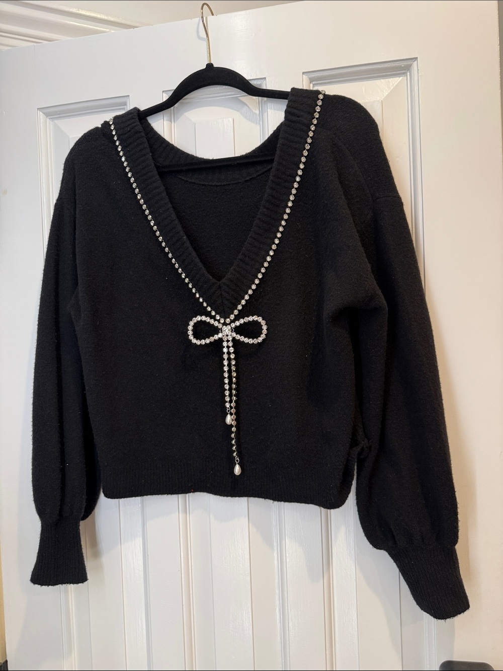 Express size medium Black V-Neck Sweater with Crystal Bow Accent